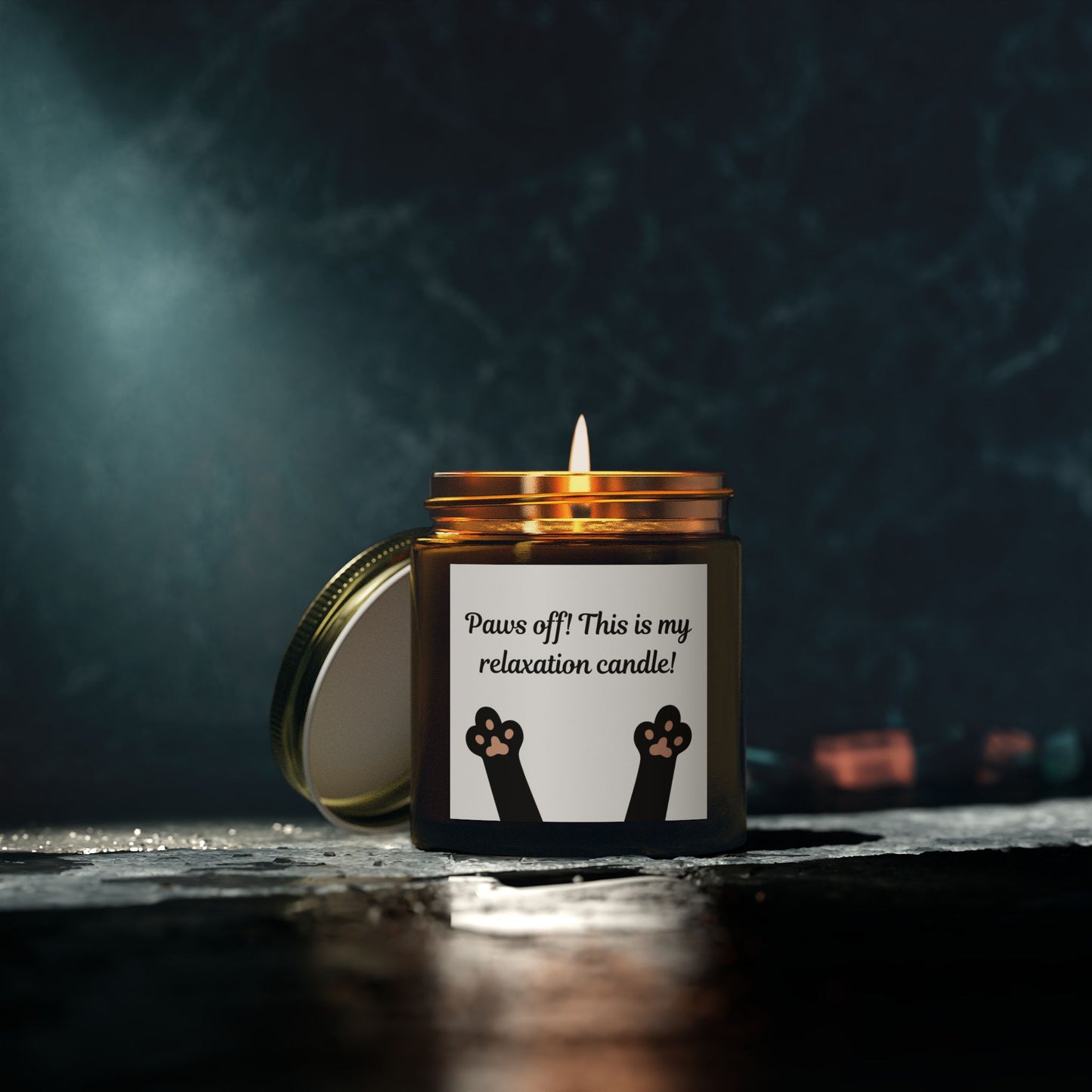 candle with cat paw image and paws off text
