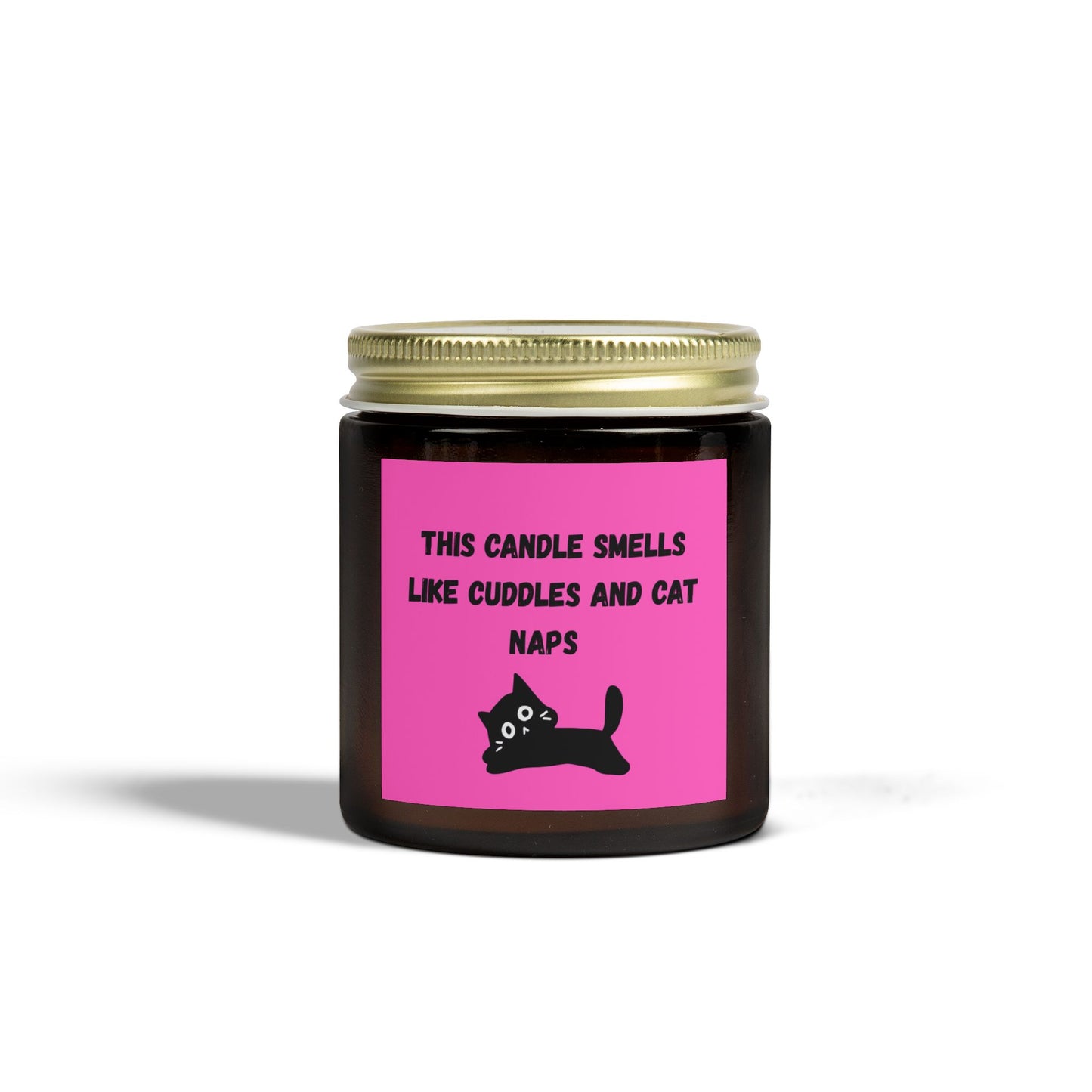 pink labelled candle with cuddles and cat nap text