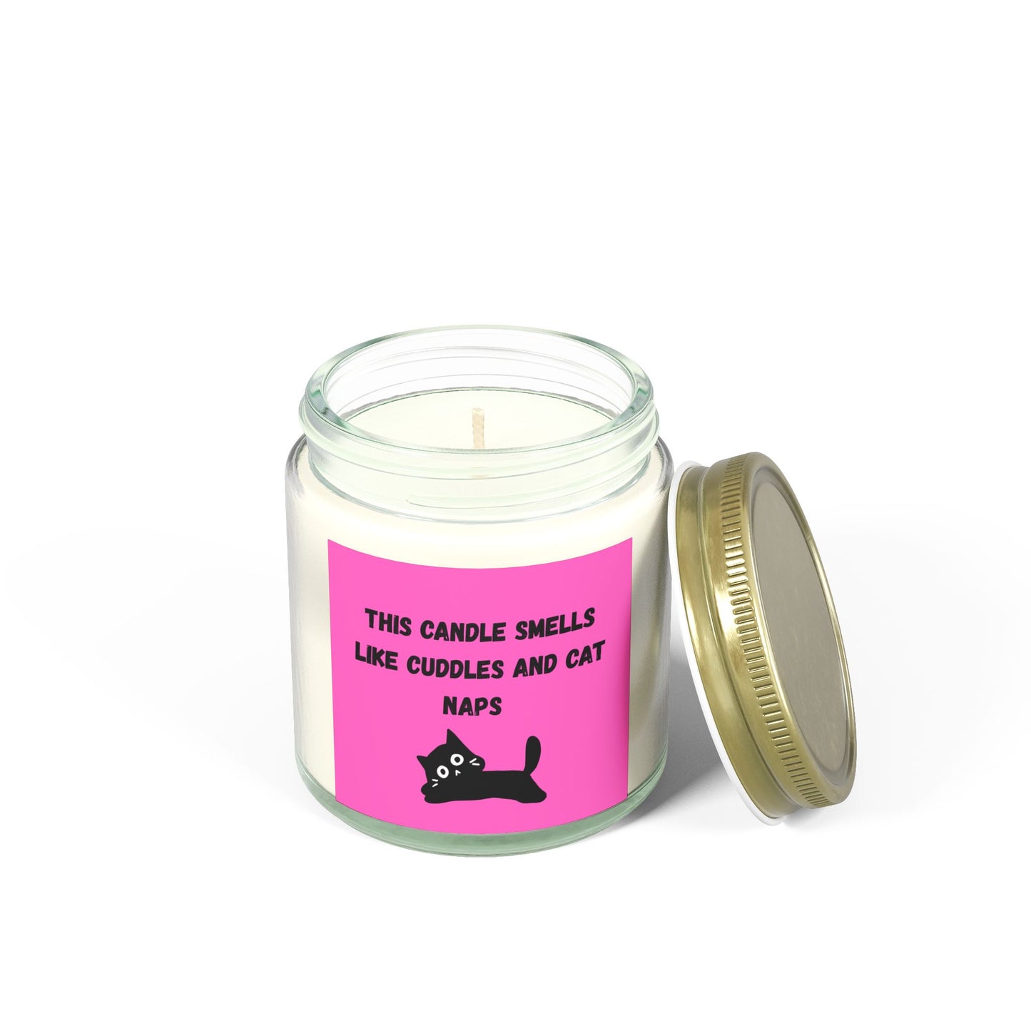 pink labelled candle with cuddles and cat nap text