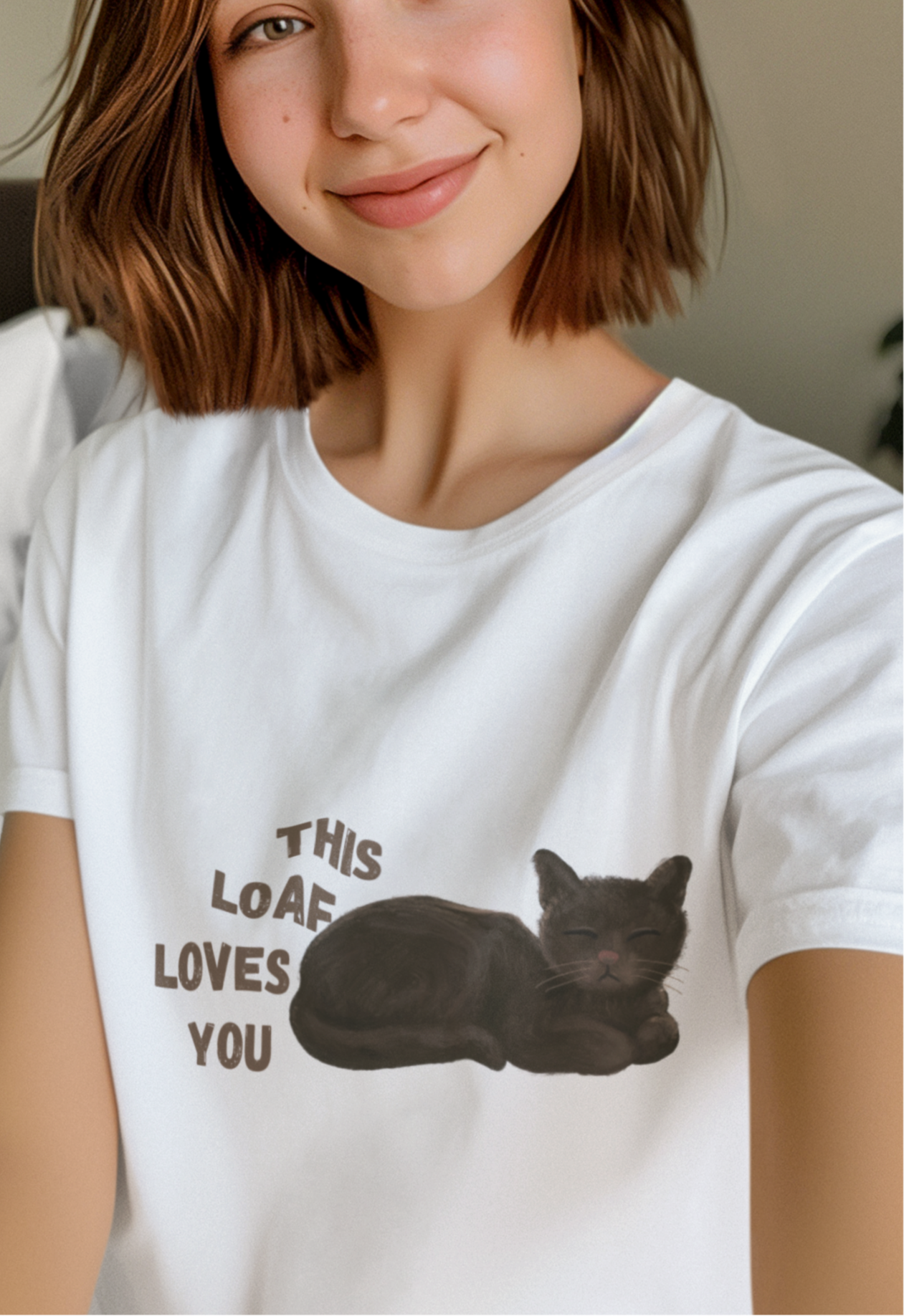 White t shirt- 'This loaf loves you' text with brown cat image