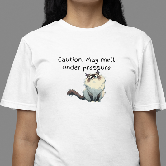 Person wearing a white t-shirt with a cartoon cat and text on a gray background